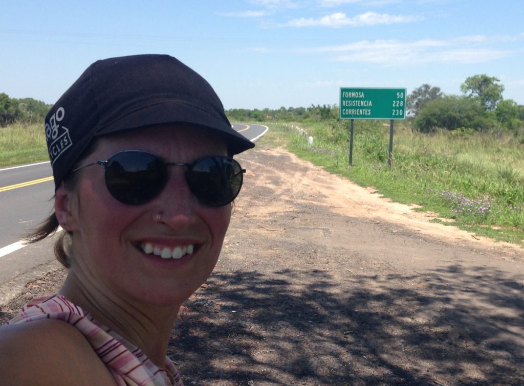 Cyclist on the side of the road